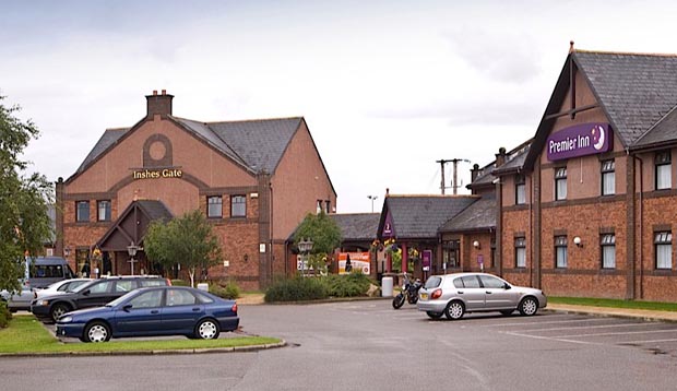 Car park area and exterior at Premier Inn Inverness East